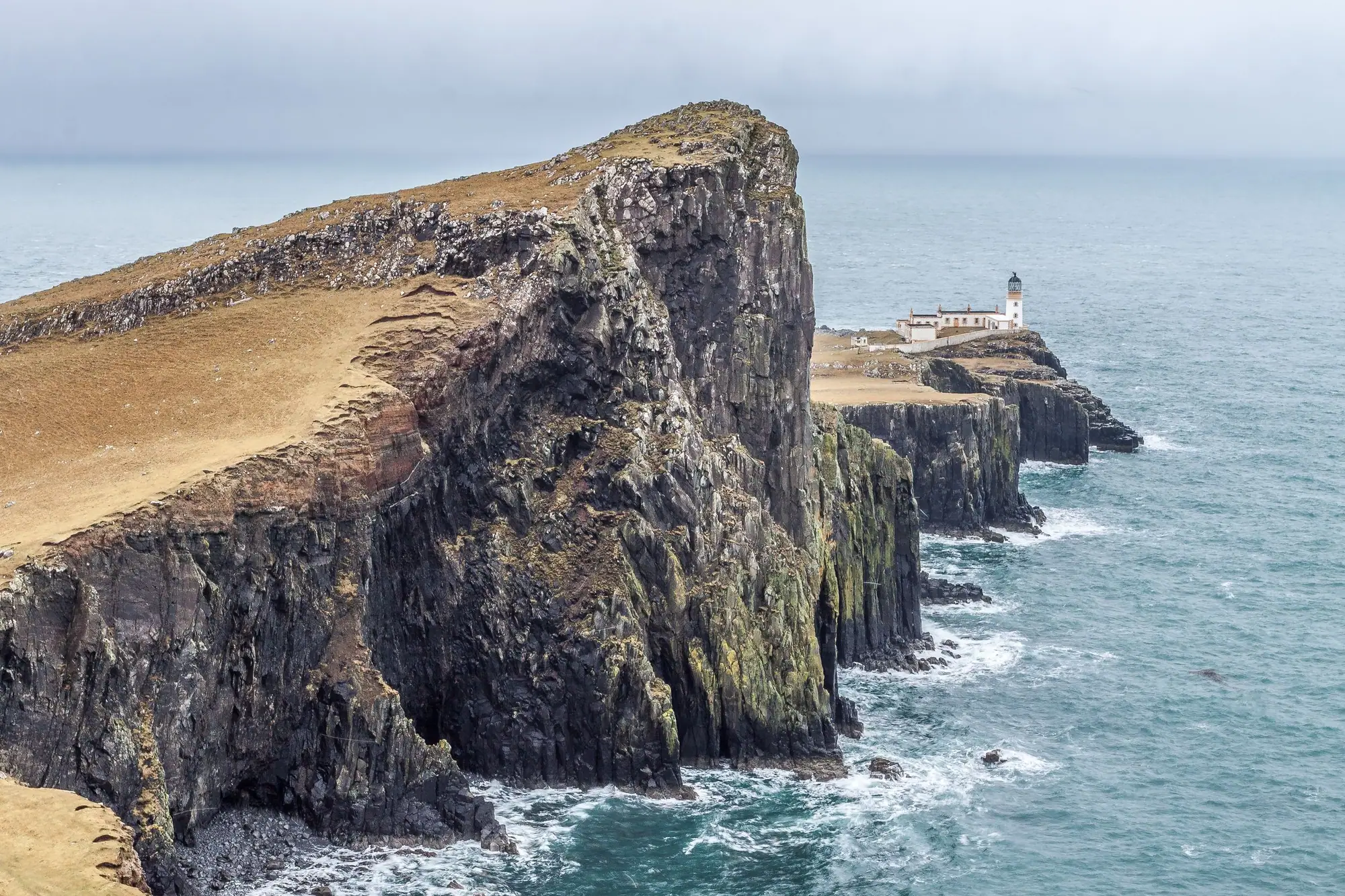 Sea cliffs and a lighthouse at Neist Point, Isle of Skye